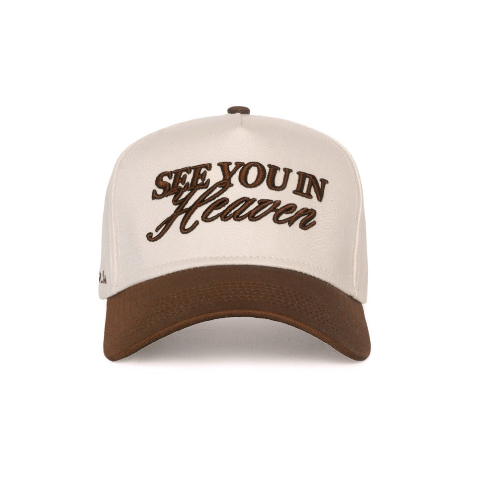 Cream and brown snapback hat with 'See You in Heaven' text on a white background